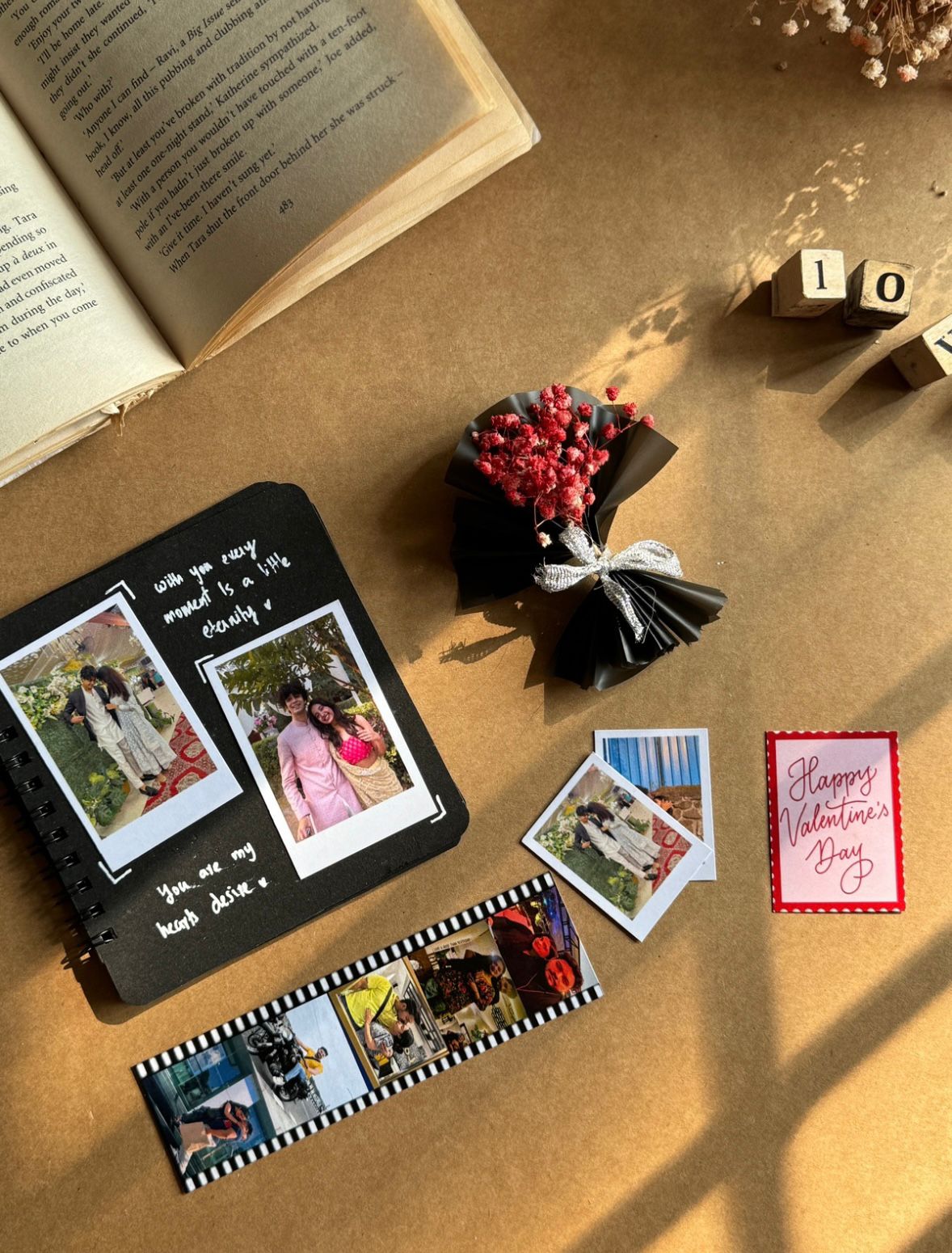 Black combo personalized gift box with photo book, polaroids and film strip
