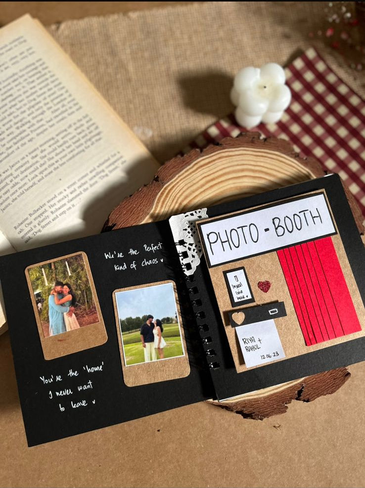 Handcrafted black scrapbook with decorative elements and personalized photo keepsake design