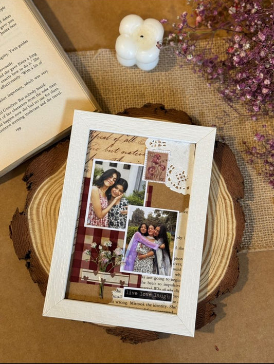 Handcrafted cute decorative photo frame with multiple small photos, placed on wooden surface with sparkly décor