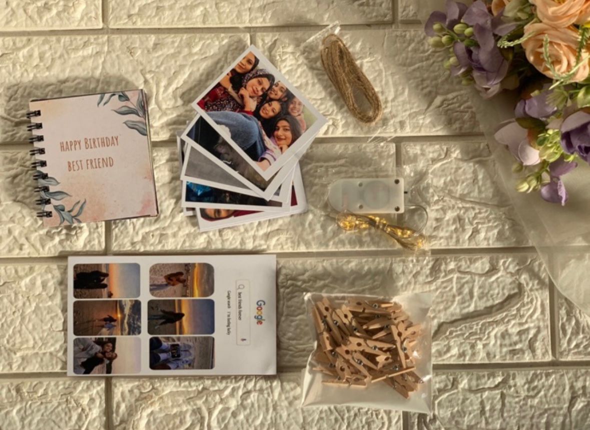 Polaroid photo kit with mini book, fairy lights and photo clips
