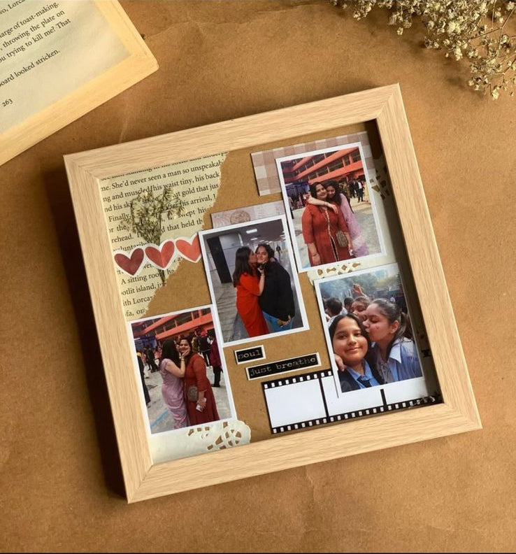 Handcrafted vintage-style picture frame with multiple photo slots on brown surface