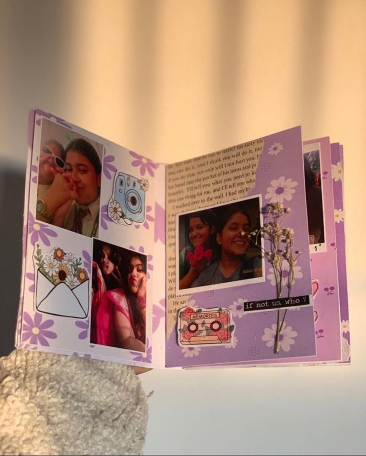 Handcrafted color scrapbook with decorative colorful pages and personalized photo keepsake gift