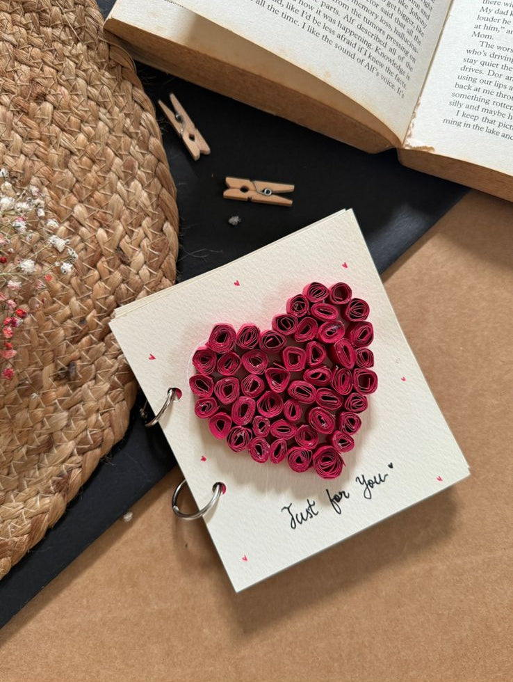Handcrafted personalized photobook with heart-shaped floral design cover, keepsake photo album gift
