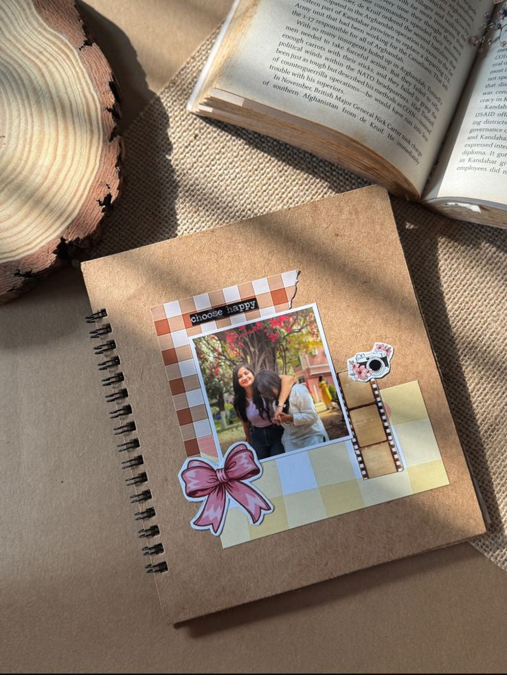 Handcrafted vintage scrapbook with custom-designed pages and personalized theme, photo keepsake gift