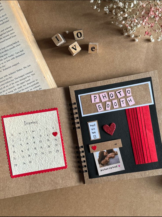 Handcrafted vintage scrapbook with decorative pages, personalized photo keepsake gift with stamps and paper elements